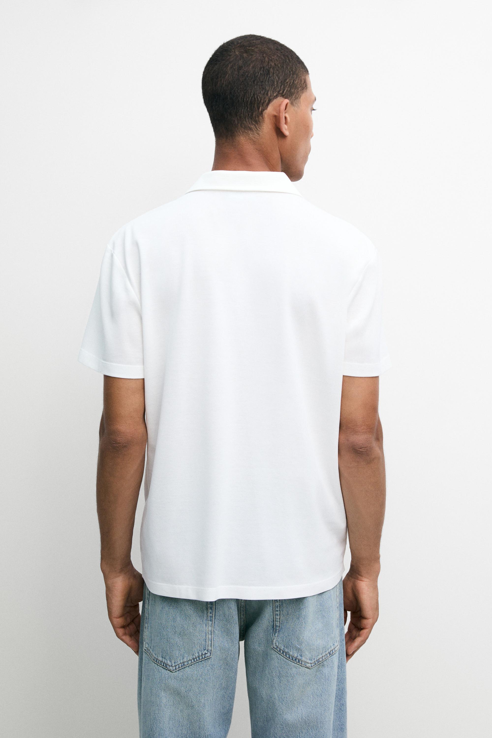 Polo piqué micro-texturé à col en V